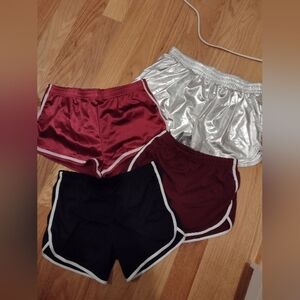 Bundle of silver, red, maroon, and black athletic shorts, all NWOT